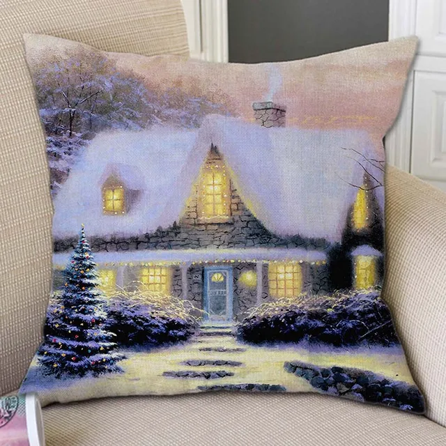 아늑함과 축제적인 분위기로 가득 찬 눈 덮인 집 크리스마스 장식 베개