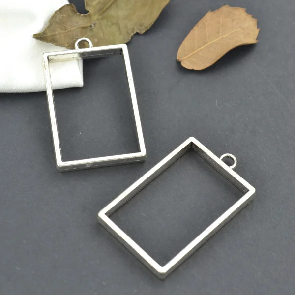 

Wholesale 20pcs/lots Metal tibetan silver charms rectangle hollow pendants fit diy necklace jewelry making 37*23 3256