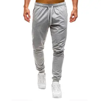 

New Hot Casual Men Solid Color Drawstring Elastic Loose Pants Pockets Autumn Trousers