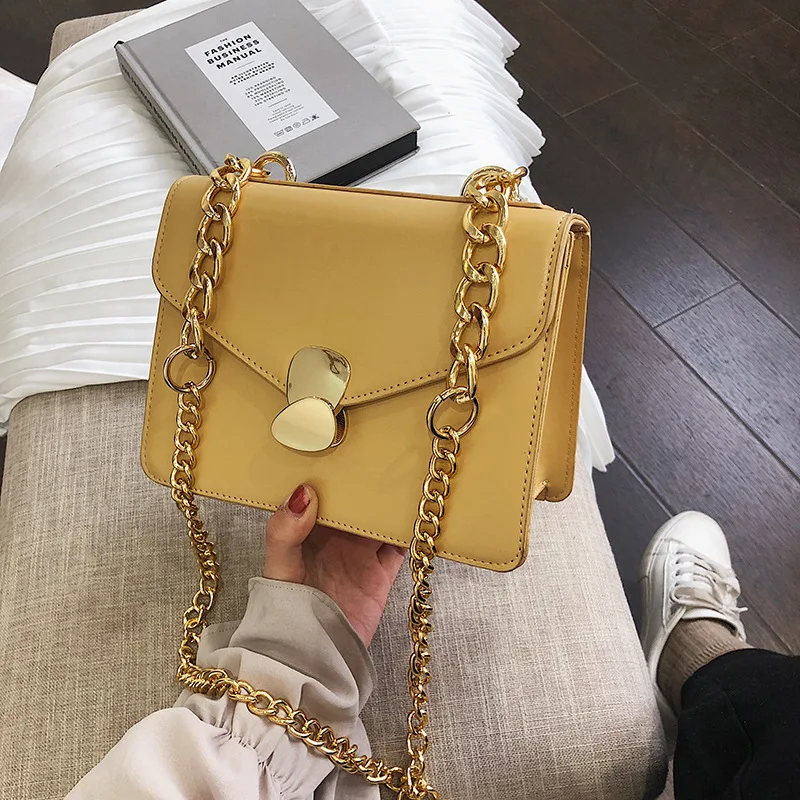 The new Korean version of the one-shoulder straddle Bags with simple texture and Western style