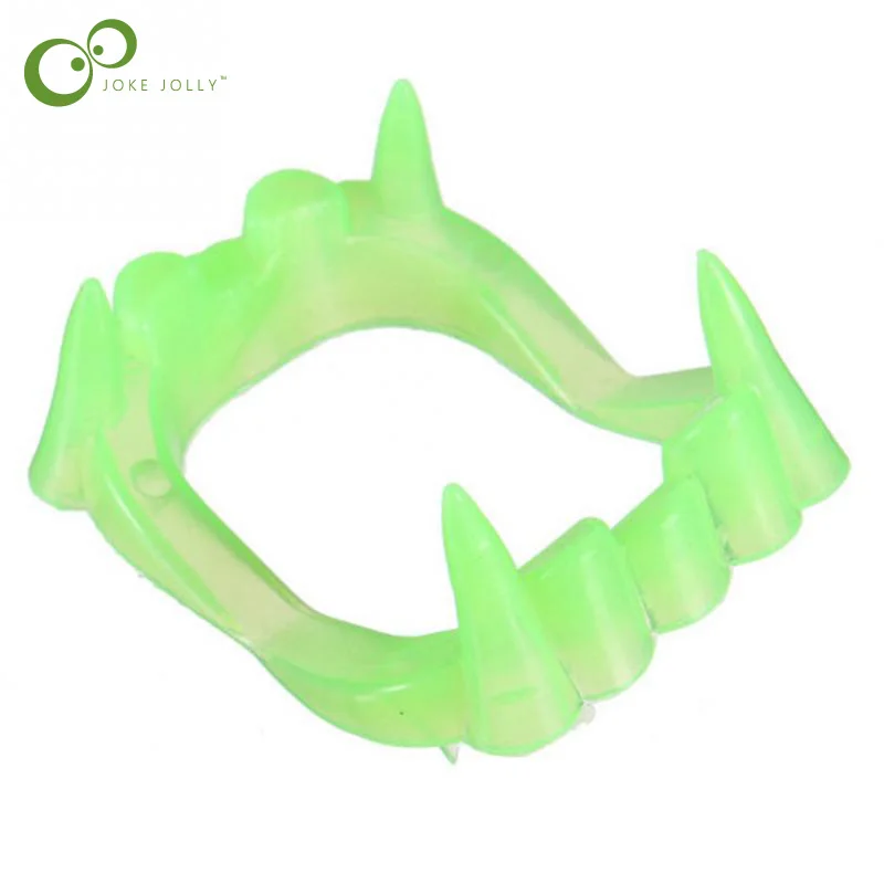 светящиеся зубы. подсветка для рта. светящиеся зубы вампира. игрушечная челюсть вампира. мармеладные клыки.