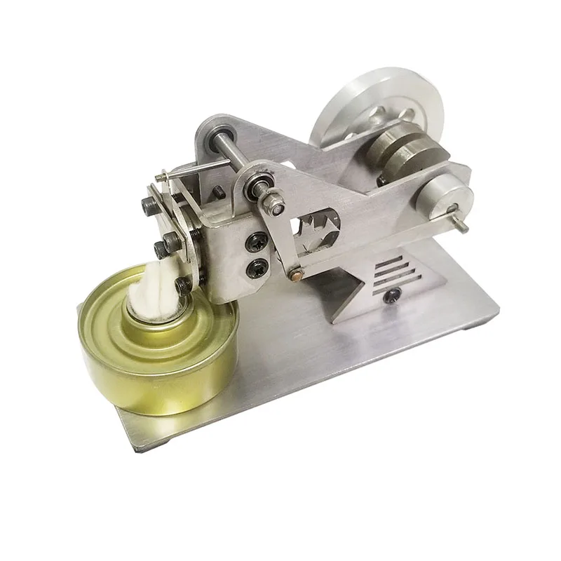 Stirling engine model suction type all-metal engine steam engine miniature motor toy gift. Stirling engine model suction type all-metal engine steam engine miniature motor toy gift.