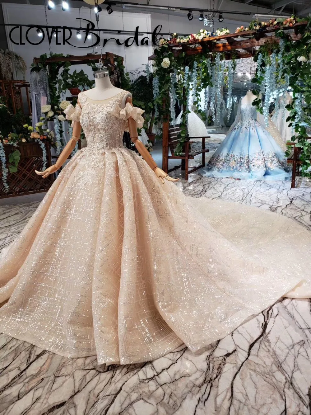 

Luxury illusion neckline sequins lace appliques off the shoulder bling bling champagne wedding gowns 2019 huge pleated skirt