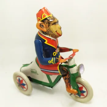

Adult Collection Retro Wind up toy Metal Tin Monkey ride a tricyc Mechanical toy Clockwork toy figures model kids christmas gift