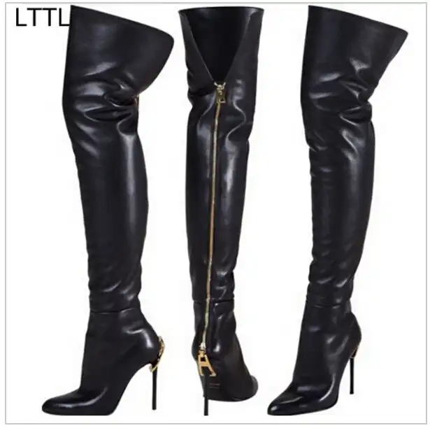 black boots with gold zip