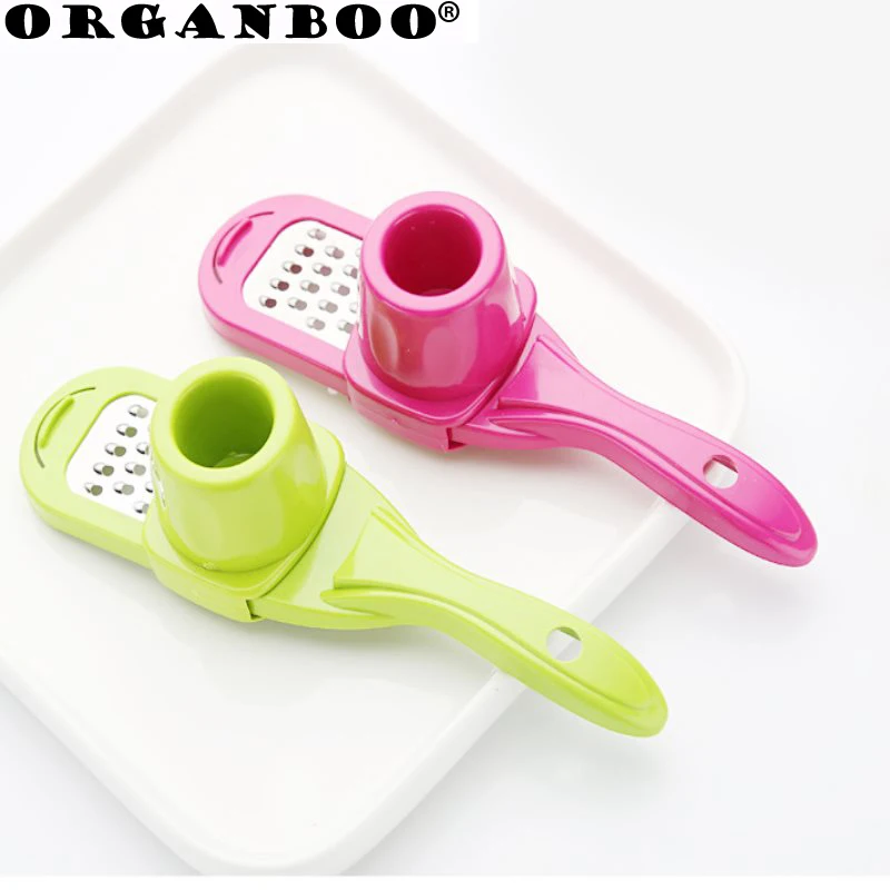 

1PC Multi-function garlic machine creative manual grinding ginger household plastic + stainless steel thickening garlic grater