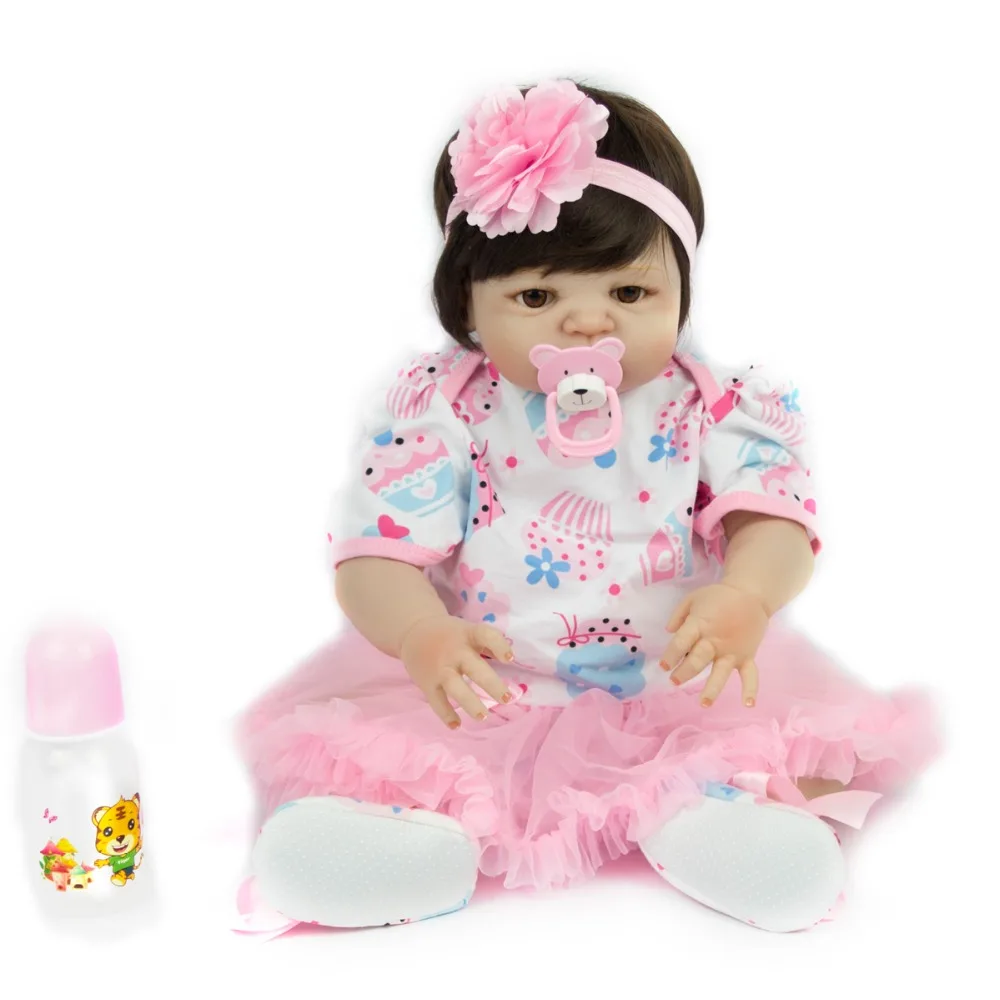 

NPKCOLLECTION57cm Fashion short hair full silicone simulation newborn baby girl with pink headflower silicone reborn baby dolls