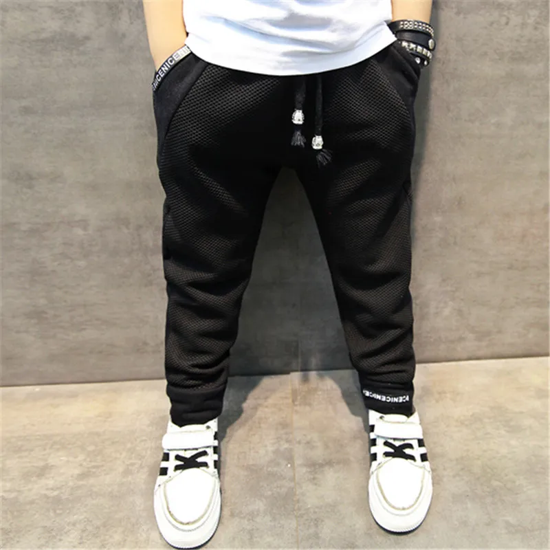 

2019 spring new children's clothing boy pants baby pants in the big children's casual feet pants children's sports trousers tide