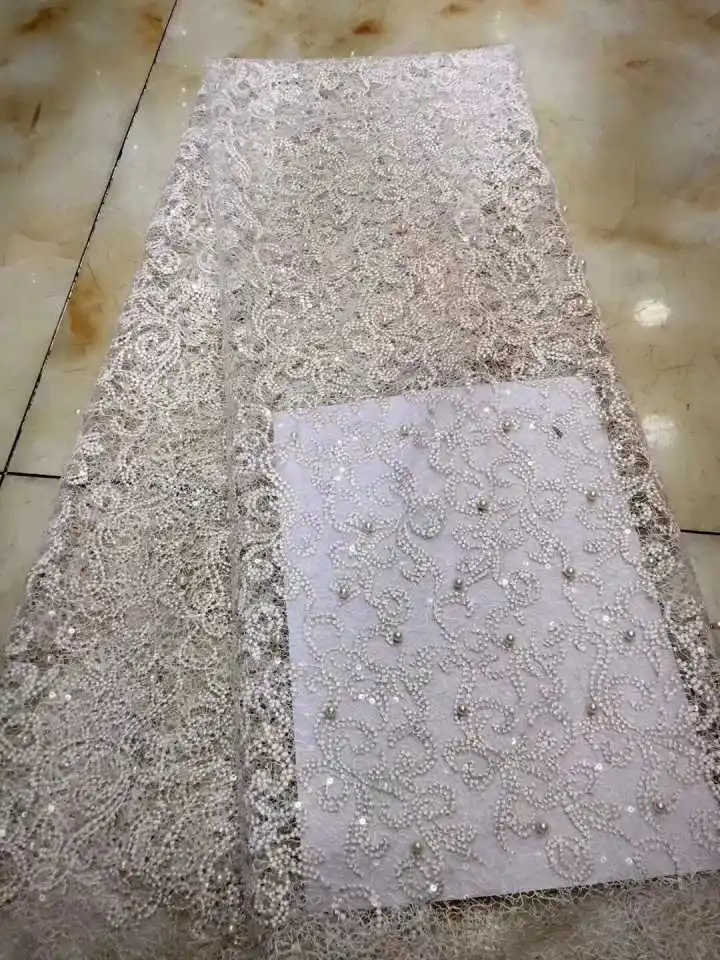 

2018 white African Lace Fabric With Sequins French Nigerian Mesh Tulle Embroidered Guipure Lace Voile Lace In Switzerland