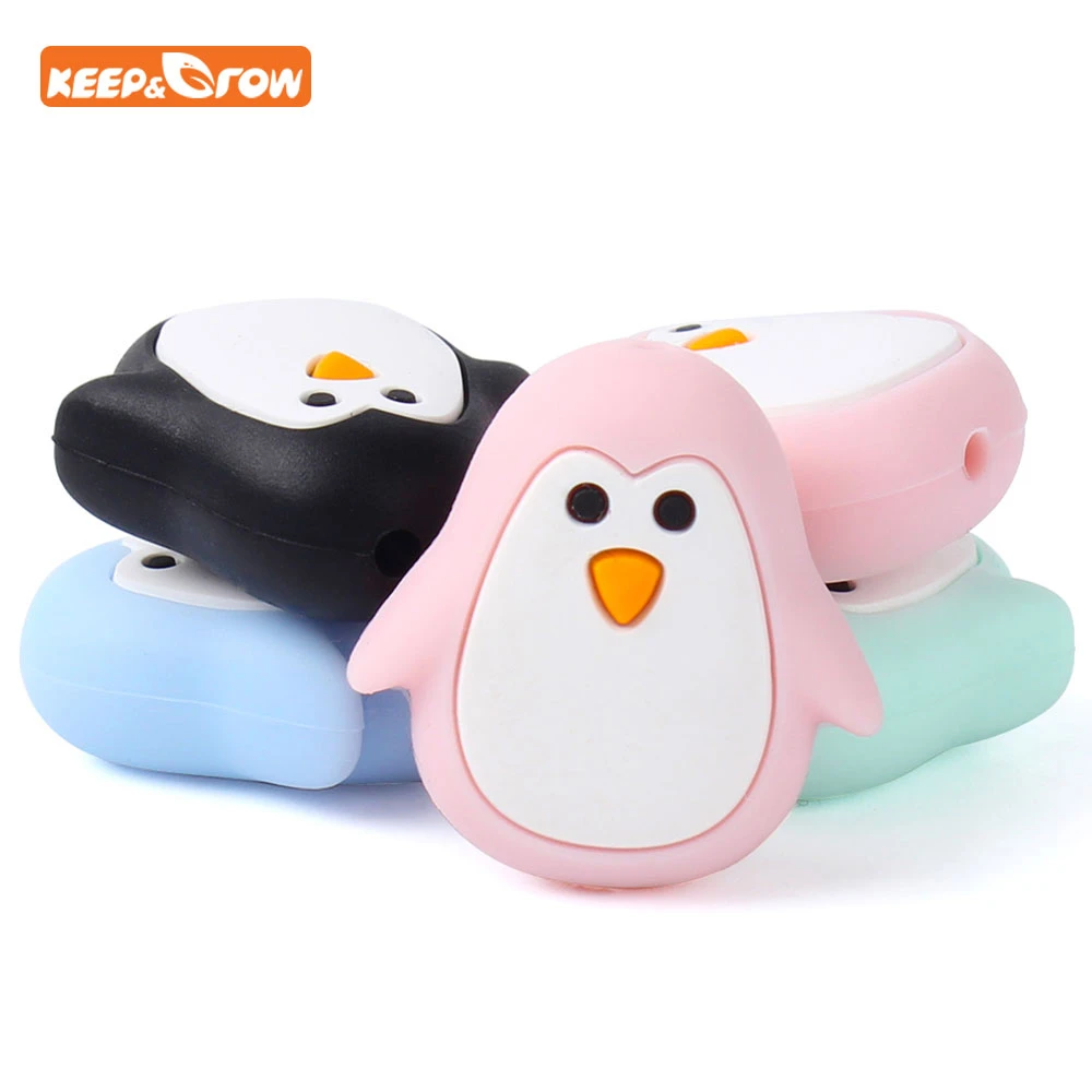 baby chewing on dummy