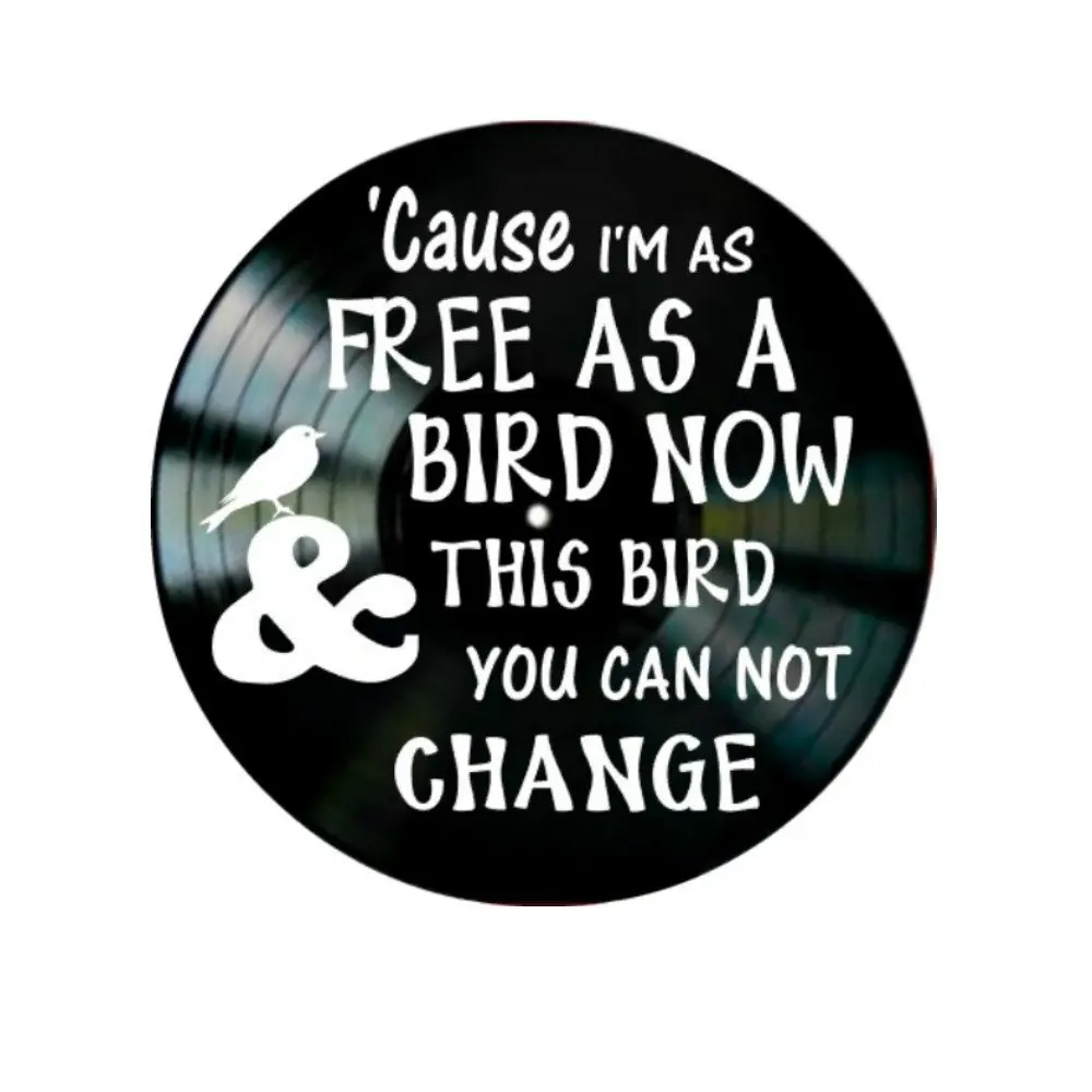 

Lynyrd Skynyrd Free Bird song lyrics on a Vinyl Record Album