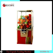 Конфеты, игрушки торговый автомат с металлической конструкции и окна трубки для малыша отскакивая или пластика капсулы с 45-56 мм