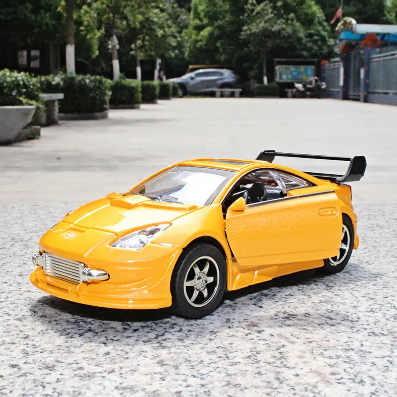 

1:32 Diecast Toyota Celica Sports car Alloy car model Sound and light pull back function The door can be opened kids toys