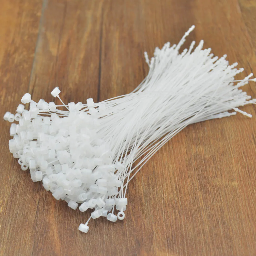 

White plastic snap tag rope buckle hand needle tip head snap fastener
