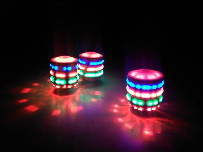 spinning top with lights and music