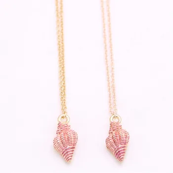 

sea snail pendant necklace Mini sea snail pendant necklace designed for women