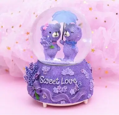 

A Valentine's Day gift girl children's birthday music box rotating snow crystal ball music box.