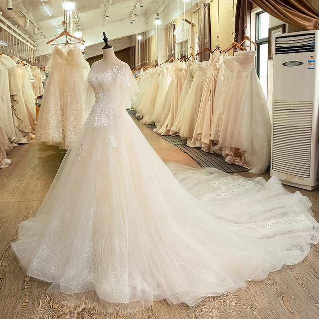 SL-6044 Elegant Illusion Bodice Lace Puffy Short Sleeve Wedding Dress 2019 Cheap Long Train Backless Wedding Bridal Dresses 3
