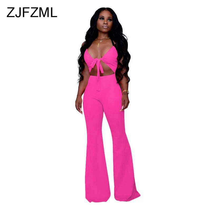 

Sexy Deep V Neck Club Jumpsuit Women Sleeveless Hollow Out Bow Neon Green Rompers Summer Backless Skinny Bell Bottom Playsuit