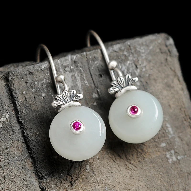 

2019 new natural authentic Hetian jade 925 silver inlaid jade and peace buckle earrings female models to send certificates