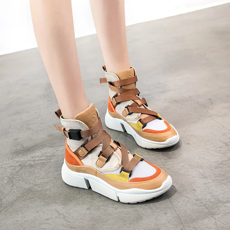 

2018 new casual shoes female Korean version of the thick bottom high to help leather canvas color matching lace single shoes.