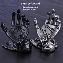 Череп левой рукой Нержавеющая сталь Непоседа Спиннер с дисплеем Стенд съемки реквизит высококачественные декоративные украшения Аксессуары