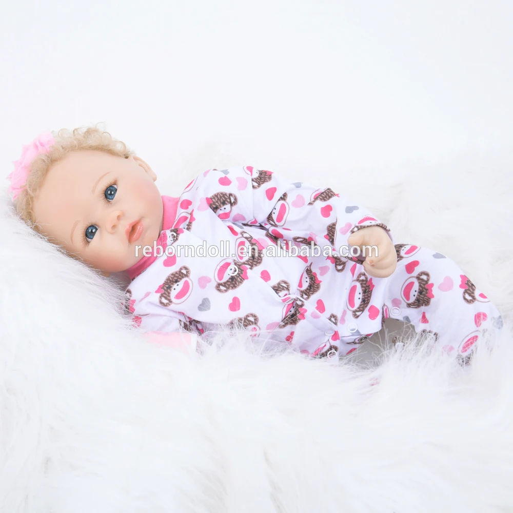 muñeco bebe ojos grandes