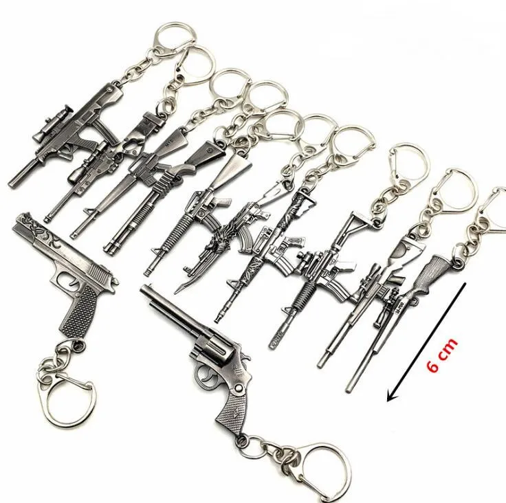 

Shooting game PUB CS Simulation Gun Pendant Keychain Cool Men Metal Weapon Model AK47M16M4AWM Revolver Gun Key Ring For Children