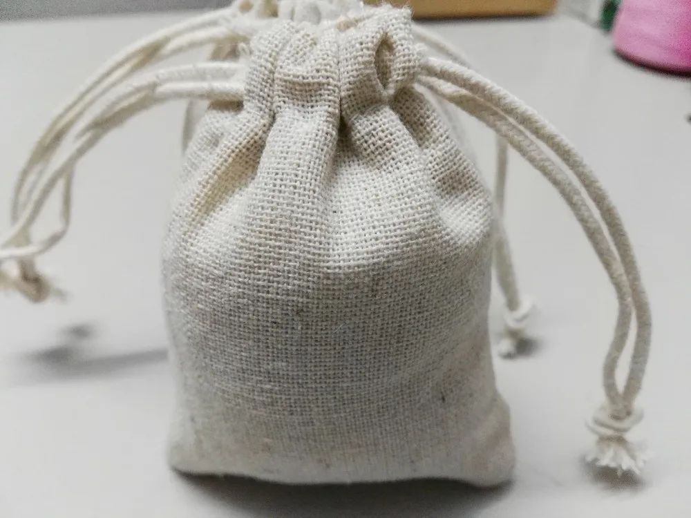 SPECIAL SALE 50/lot 7*9cm overlocked linen fabric jewelry bag wholesale