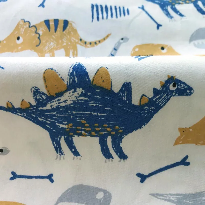Хлопок ткань саржевого мультфильм динозавра синий маленькие цветы ткань для DIY кроватка постельные принадлежности подушки одежда стеганой отделкой ручной работы Декор