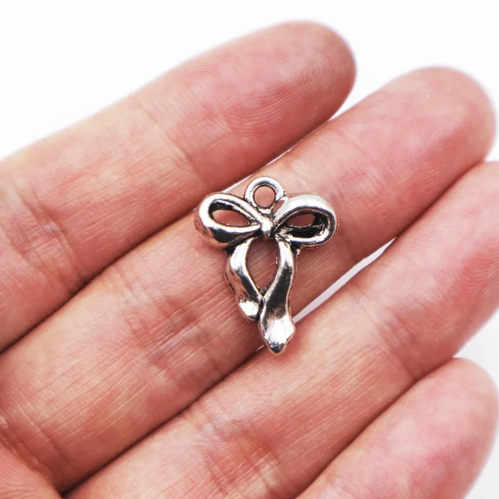

Hot sell 15pcs metal antique silver charms bow-knot charms pendant for necklace jewelry findings