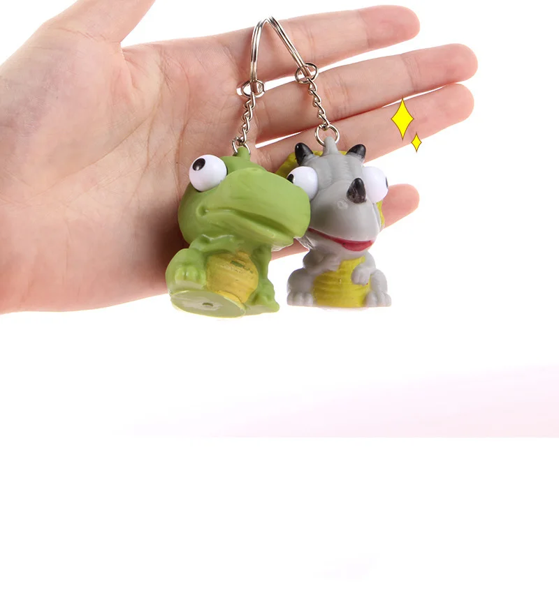 Best selling Cute cartoon squeezing key chain Dinosaur design Spoof decompression Plaything children's toy pendants Cultivating