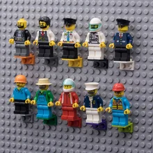 Cheap 100pcs/lot high quality building block minifigs holders Small particle building blocks Building walls toys for children Cheap 100pcs/lot high quality building block minifigs holders Small particle building blocks Building walls toys for children