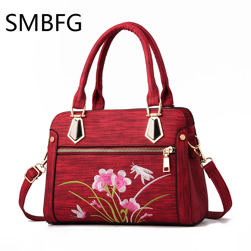 Buy women leather handbags female flower embroidery