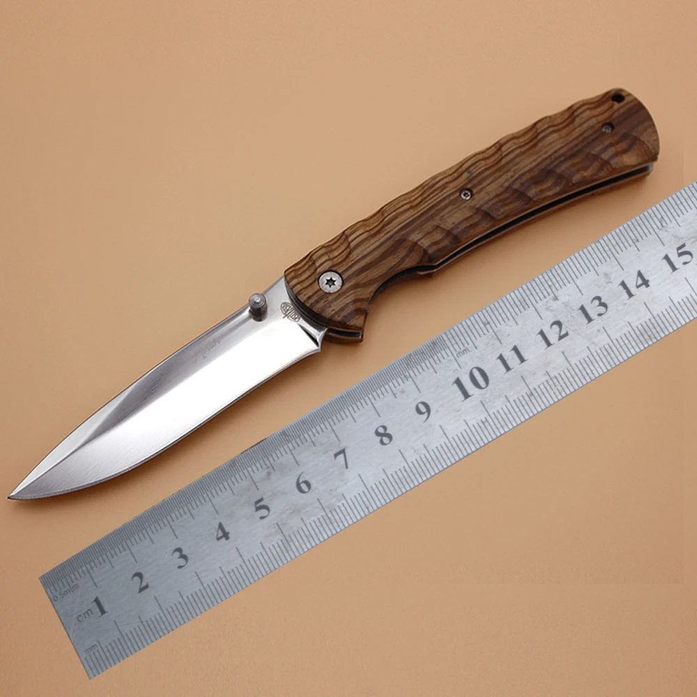 Comprar 2017 Nuevo cuchillo de bolsillo táctico plegable al aire libre cuchillo de supervivencia de rescate mango de madera herramienta de cuchillo de caza de Camping