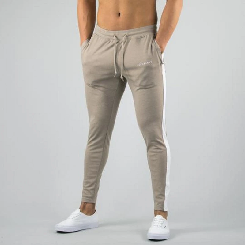 Осенние мужские спортивные штаны для фитнеса, мужские спортивные штаны для бодибилдинга и тренировок, хлопковые брюки, Повседневная модная спортивная одежда, Брендовые брюки-карандаш