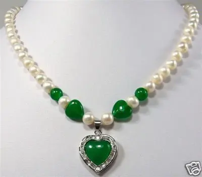 

White pearl necklace and heart shaped jades pendant