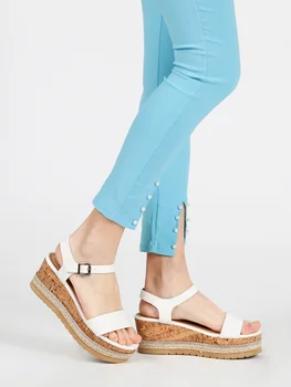 

White sandals with wedge heel and platform