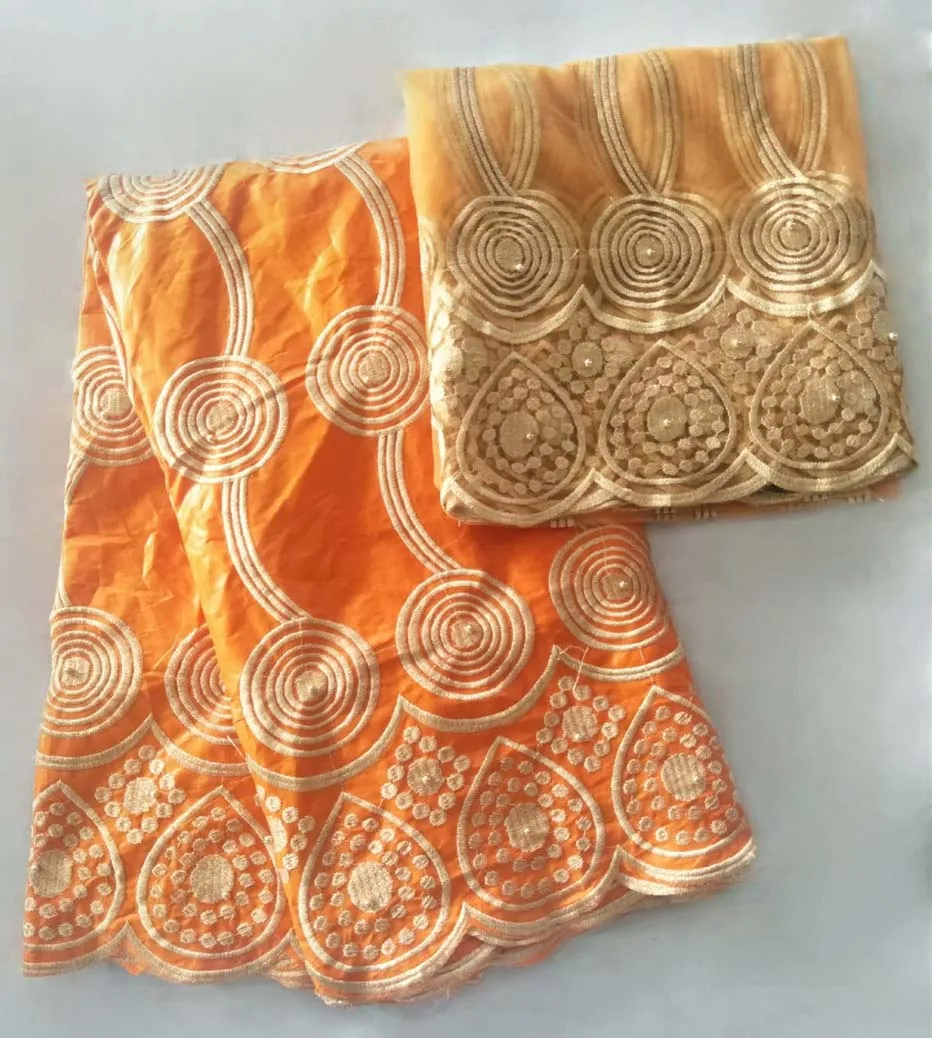 

Beautifical orange Bazin riche fabric gold african embroided basin riche getzner Lace Fabric with 2yards french tulle lace