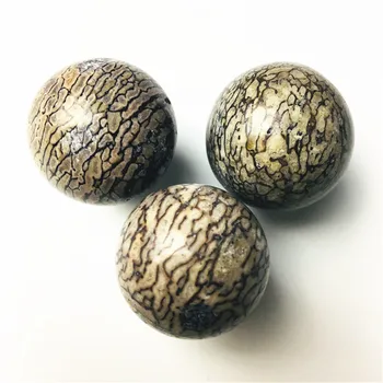 

from Malagasy dinosaur bone ball reiki magic heals natural gemstones and mineral specimens