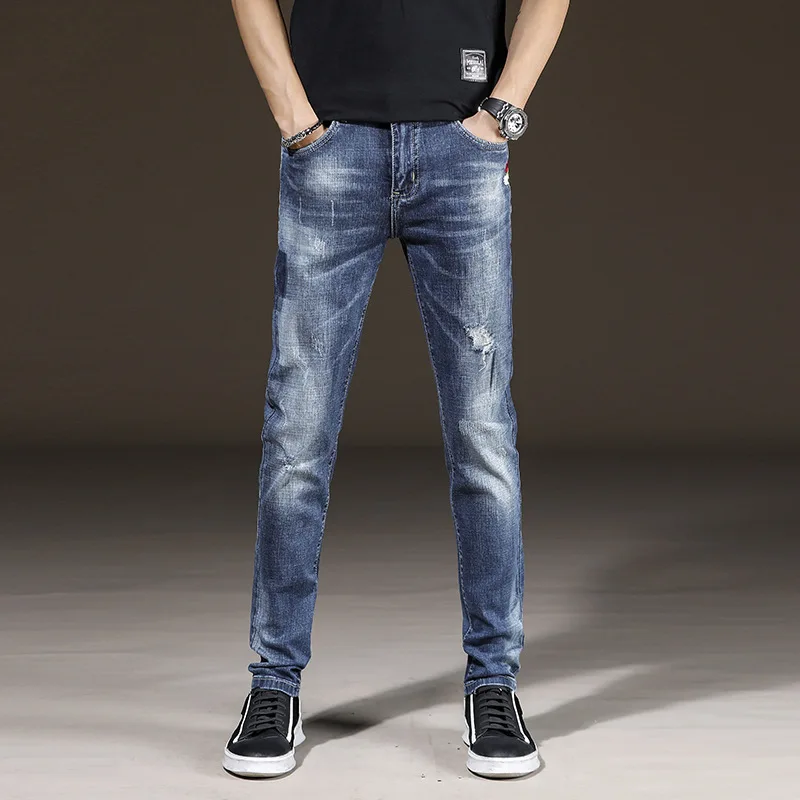 

2019 spring and summer new lightweight jeans men's slim stretch youth feet pants Korean version of the slim men's pants was thin