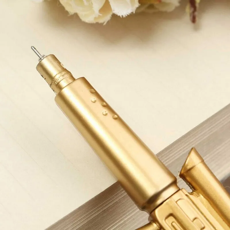 Творческий Смешные Kawaii содействие 0.38 мм ручки ребенка шариковая Золотой пистолет Форма перо пистолет ручки Подарки для школьных