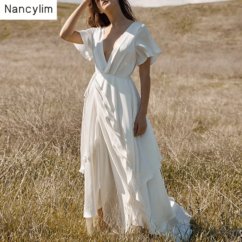 Super Fee Lange Witte Jurk Vrouwen Temperament V Kraag Vlinder Mouw Ruches Jurken Meisjes Dame Vakantie Maxi Strand Jurk Super Fee Lange Witte Jurk Vrouwen Temperament V Kraag Vlinder Mouw Ruches Jurken Meisjes Dame Vakantie Maxi Strand Jurk