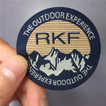 

Factory Price Custom -Made High Density Fancy Cutting Woven Patch with Black Fusing Backside