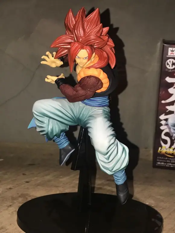 

Anime Dragon Ball Z Son Goku Super Saiyan 4 Red Hair Chocolate Figuration Action Figure PVC DBZ Model 23cm