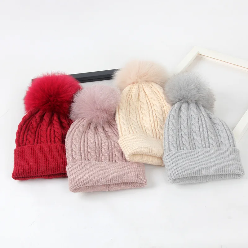 

2018 new hat female winter 15CMPOMPOM fox fur ball twist wool cap wool earmuffs warm cashmere cap knit hat