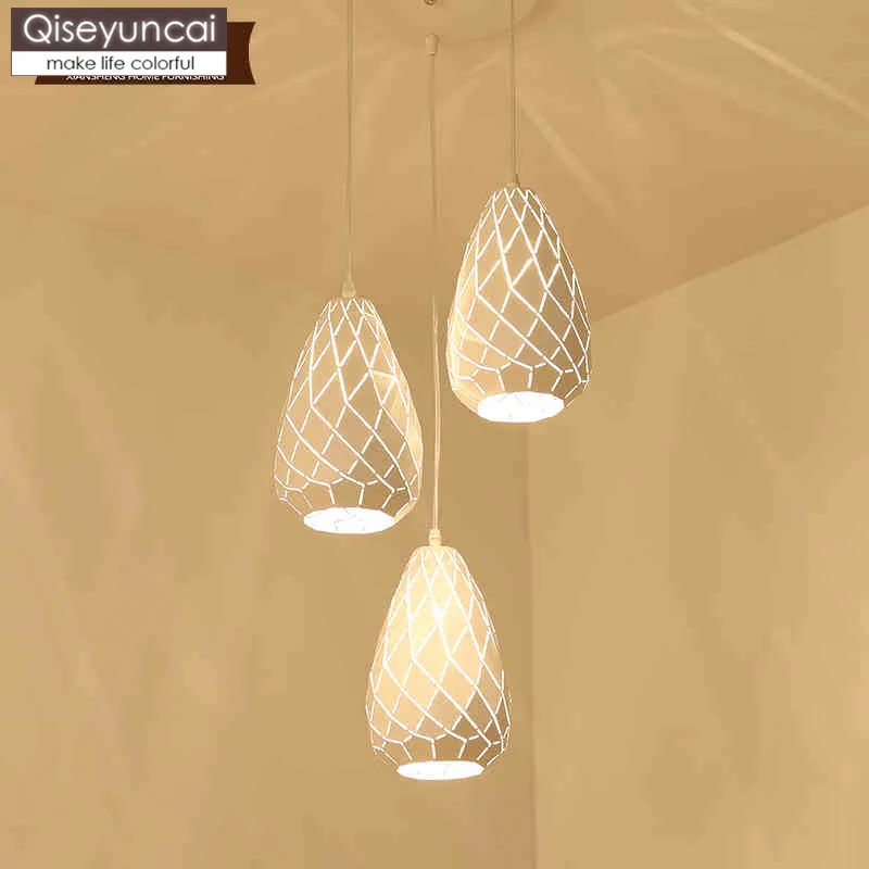 

Qiseyuncai Modern minimalist three-headed restaurant chandelier creative fashion atmosphere warm hollow design restaurant lamps