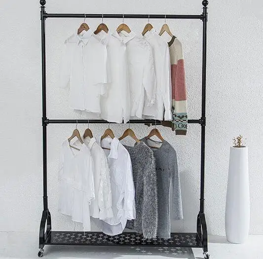 Tieyi clothing store. Display rack. Male and female children's wear double pole lift and floor type with wheel hanger.1