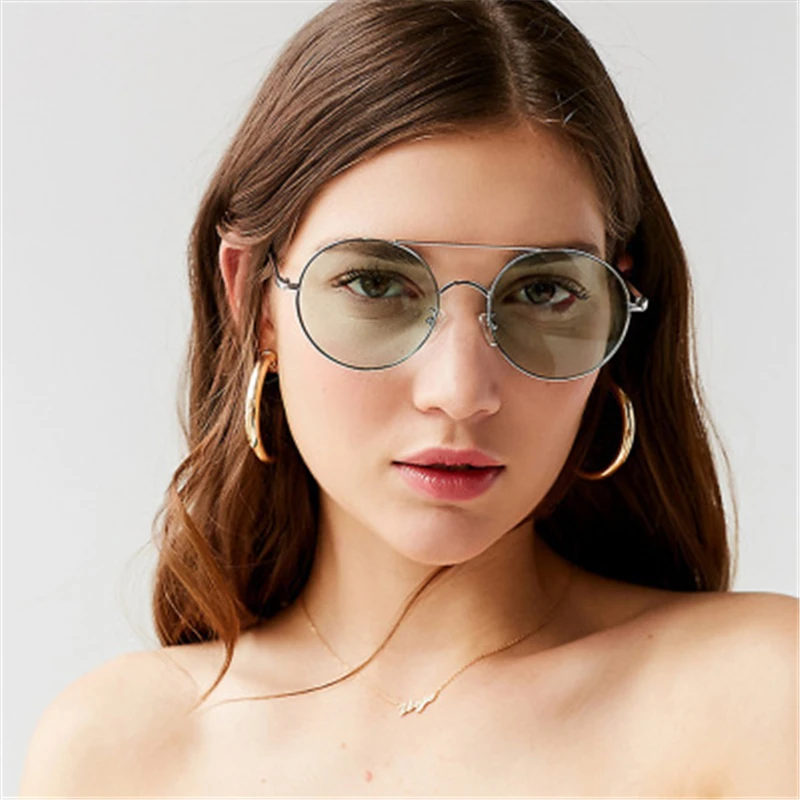

2019 new female models sun near metal round frame sunglasses Europe and the United States trend ocean piece sunglasses retro dou