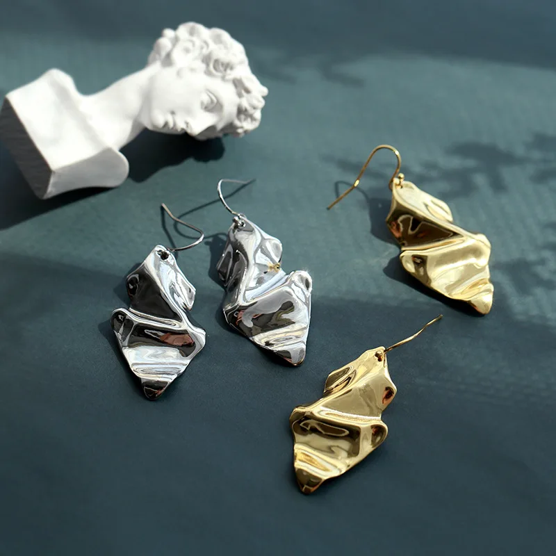 

Simple metal wind exaggerated geometric earrings concave-convex folded earrings in Europe and America